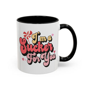 I'm a Sucker for You, Valentine's Day Lollipop Mug - Available in a variety of vibrant accent colors, and in 15oz and 11oz sizes. Dishwasher and microwave safe.