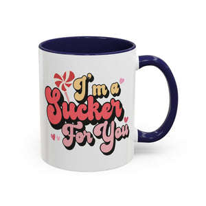 I'm a Sucker for You, Valentine's Day Lollipop Mug - Available in a variety of vibrant accent colors, and in 15oz and 11oz sizes. Dishwasher and microwave safe.