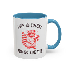 Love is Trashy and So Are You, Anti-Valentine's Day Raccoon Mug - Available in a variety of vibrant accent colors, and in 15oz and 11oz sizes. Dishwasher and microwave safe.