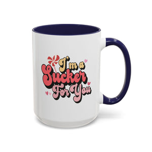 I'm a Sucker for You, Valentine's Day Lollipop Mug - Available in a variety of vibrant accent colors, and in 15oz and 11oz sizes. Dishwasher and microwave safe.