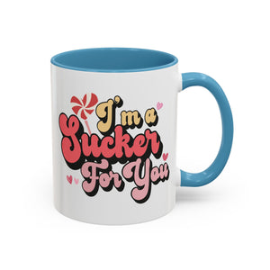 I'm a Sucker for You, Valentine's Day Lollipop Mug - Available in a variety of vibrant accent colors, and in 15oz and 11oz sizes. Dishwasher and microwave safe.