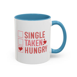 Single, Taken, Hungry Anti-Valentine's Day Mug - Available in a variety of vibrant accent colors, and in 15oz and 11oz sizes. Dishwasher and microwave safe.