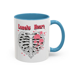 Lovely Heart, Anti-Valentine's Skeleton Mug - Available in a variety of vibrant accent colors, and in 15oz and 11oz sizes. Dishwasher and microwave safe.